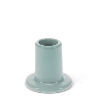 Slate grey ceramic candle holder with a cylindrical shape and wide flat base