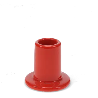 Red ceramic candle holder with a cylindrical shape and wide flat base