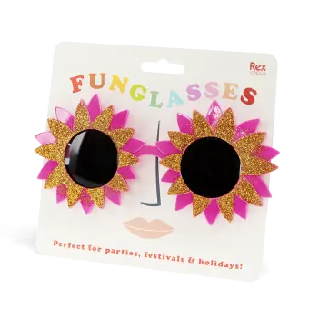 pink flower-shaped funglasses with gold glittery accents and dark round lenses with packaging
