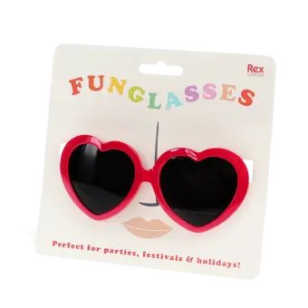 red heart-shaped funglasses in packaging
