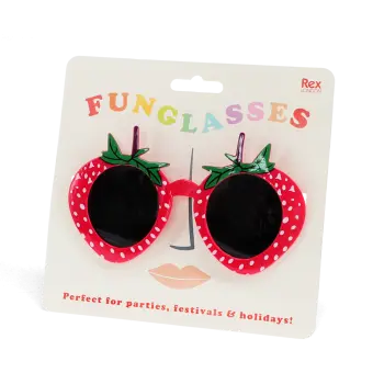Red strawberry-shaped funglasses with green leaves, and dark round lenses with packaging