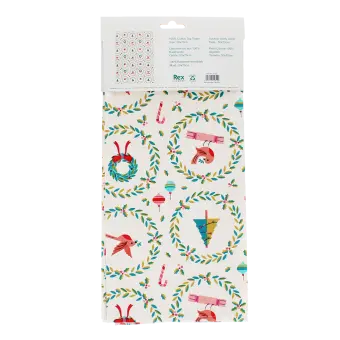 Cotton tea towel with a festive holiday design featuring Christmas trees, wreaths in a packaging