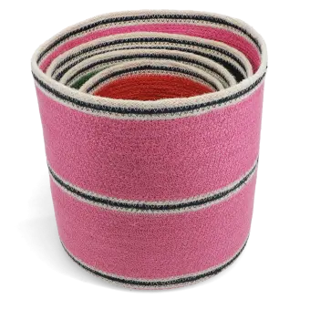 Stacked woven storage baskets in varying sizes and colours 