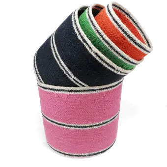 Four woven storage baskets in varying sizes and colours stacked