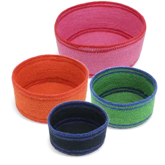 Four woven storage baskets in varying sizes and colours
