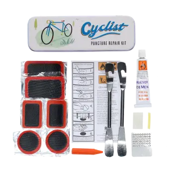 cyclist puncture puncture repair kit beside a storage tin