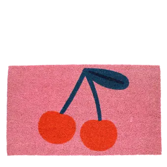 doormat featuring red cherry print in a pink background
