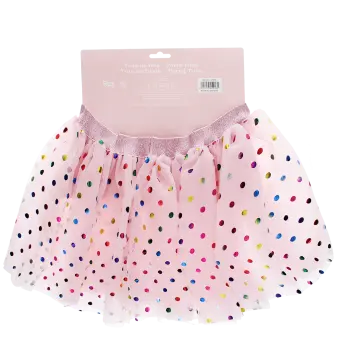 Pink skirt with colourful polka dots in multilingual instructions packaging
