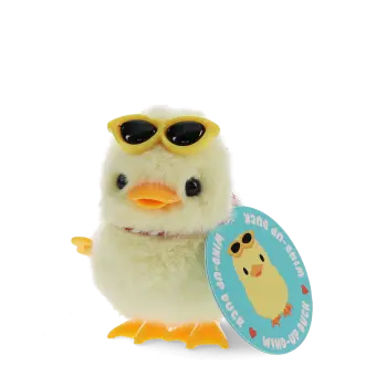 A fluffy yellow wind-up duck toy wearing yellow sunglasses with a tag 