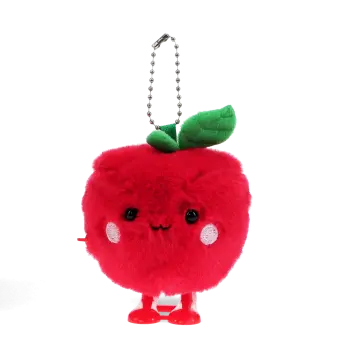 Red apple-shaped plush wind-up toy with a smiling face