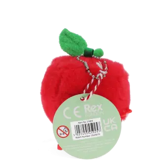 Red apple-shaped plush wind-up toy with a tag