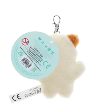Cat-shaped plush keyring with a metal clasp and a tag with safety warnings