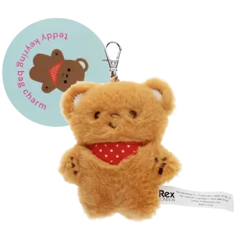 Light brown plush teddy bear keychain with a red polka-dotted bandana, metal clasp for attachment, and a tag 