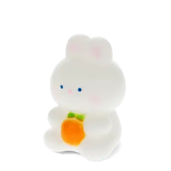 White bunny night light with an orange carrot