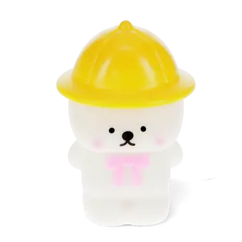 White bear night light wearing a yellow hat and pink neck tie