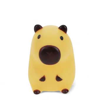 Yellow capybara night light with dark brown ears, nose and feet