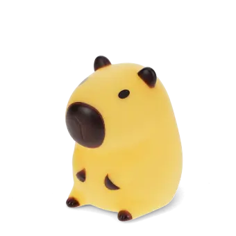 Yellow capybara night light with dark brown ears, nose and feet