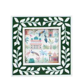 Square green picture frame with white leaf patterns on the border.