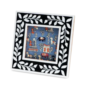 Square picture frame with white leaf patterns and navy blue colour on the border.