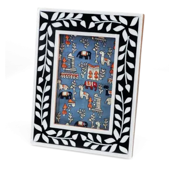 picture frame with a navy blue border and white leaf patterns