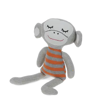 Knitted monkey toy with a grey body and wearing an orange and grey striped shirt.