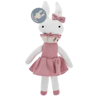 Knitted rabbit toy with long ears, wearing a pink dress with a ruffled collar and a matching bow on one ear with tag