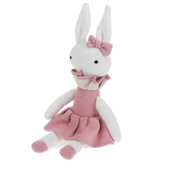 Knitted rabbit toy with long ears, wearing a pink dress with a ruffled collar and a matching bow on one ear