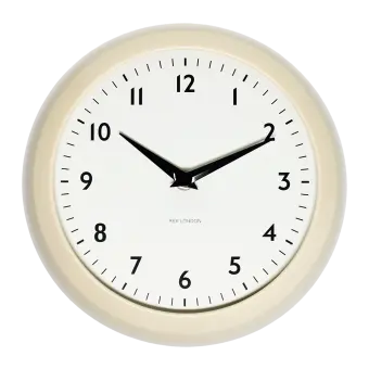 Round cream wall clock with black hands and numbers