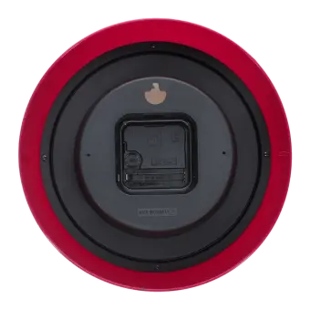 Back view of red wall clock with battery compartment and hanging hole