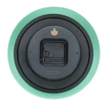 Back view of mint green wall clock with battery compartment and hanging hole