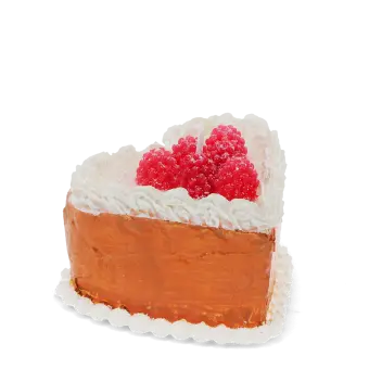 Heart-shaped cake candle with orange sides and red berry decorations on top