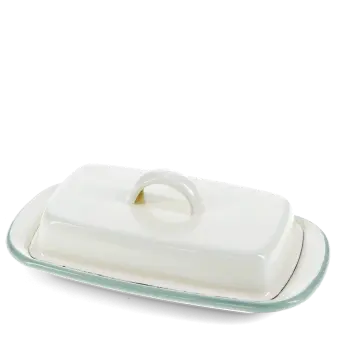 Rectangular white enamel butter dish with a pistachio green rim and a handled lid.