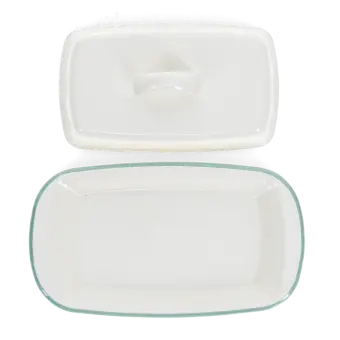 Rectangular white enamel butter dish with a pistachio green rim, shown with the lid on the side