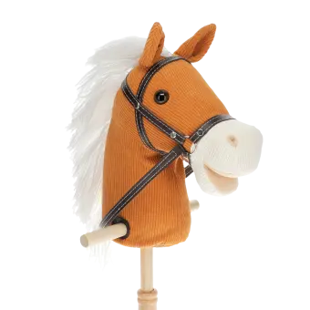 hobby horse toy with white mane and black bridle on a wooden stick