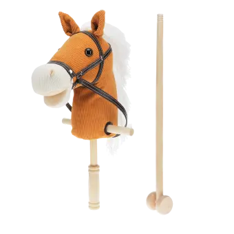 hobby horse toy with white mane and black bridle on a wooden stick