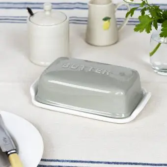 Rectangular butter dish with grey lid embossed with the word 'BUTTER
