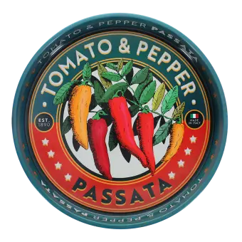Round metal serving tray with vintage-style tomato and pepper text design and chili illustration