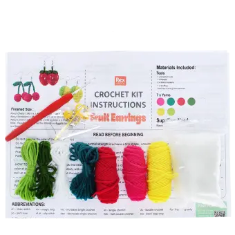 Crochet earring kit with yarns, hook, needle, stuffing, and instructions to make fruit-shaped earrings