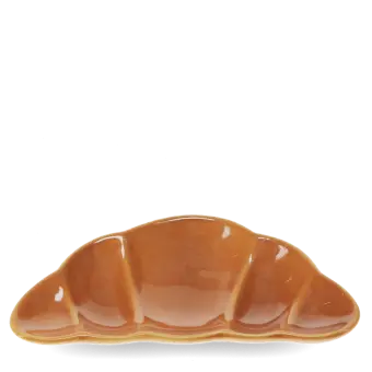 Brown ceramic trinket dish shaped like a croissant.