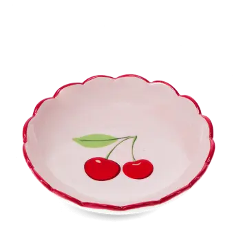 round ceramic trinket dish with scalloped red edge and cherry design in the center