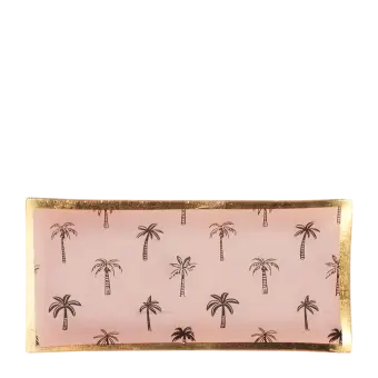 Rectangular trinket dish with gold rim and palm tree pattern on a pink background