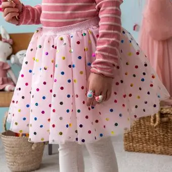 Pink skirt with colourful polka dots