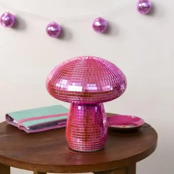 Pink disco mushroom-shaped table lamp with mirrored tiles.