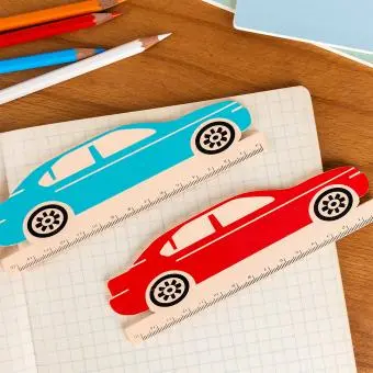 Ruler shaped like a car, with measurement markings along the bottom edge