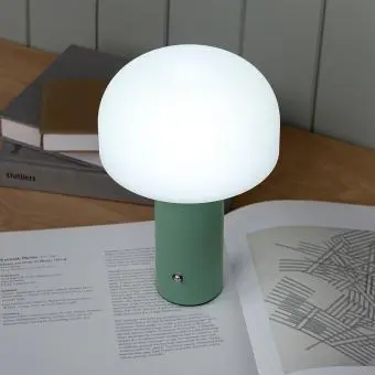 USB lamp with a white dome shade and green base.