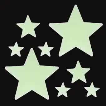 Glow‑in‑the‑dark star shapes in different sizes on a black background.