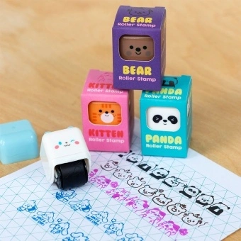 cube-shaped roller stamp with a cute animal face in a packaging. 