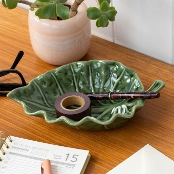 Green ceramic leaf-shaped trinket dish