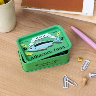 Green mini storage tin with a tuna illustration on the front.
