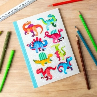 Notebook with colourful dinosaurs on a light background.